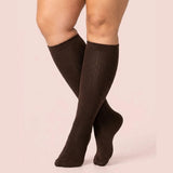 velora original wide fit compression socks coffee knee high women pose crossed ankles