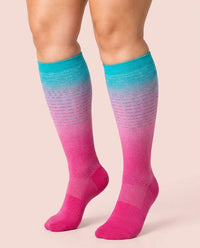 velora patterns wide fit compression socks gradient blue knee high women pose foot tucked
